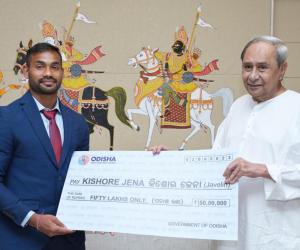 Chief Minister Naveen Patnaik felicitates javelin star Kishore Jena with a cash award of Rs 50 Lakhs for remarkable achievement at the World Athletics Championship